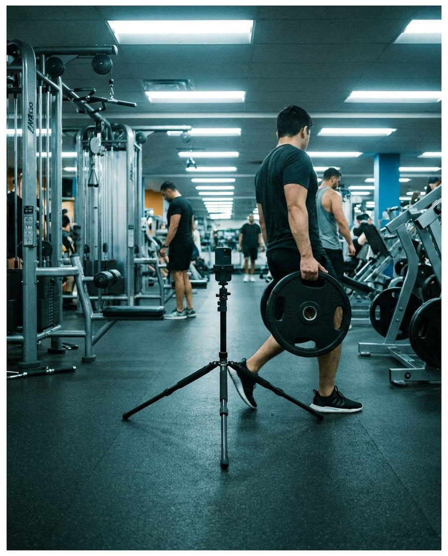 A tripod standing in a walkway with people stepping around it